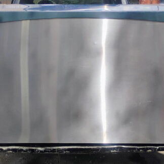 Commercial ice machine in stainless steel with a blue top, labeled Scotsman Prodigy, on a pallet outdoors.